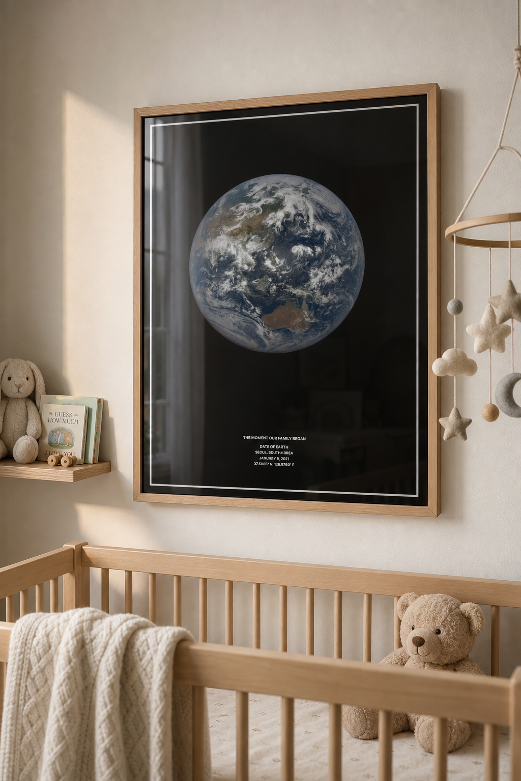 Natural framed Date of Earth print hanging in a nursery above a crib.